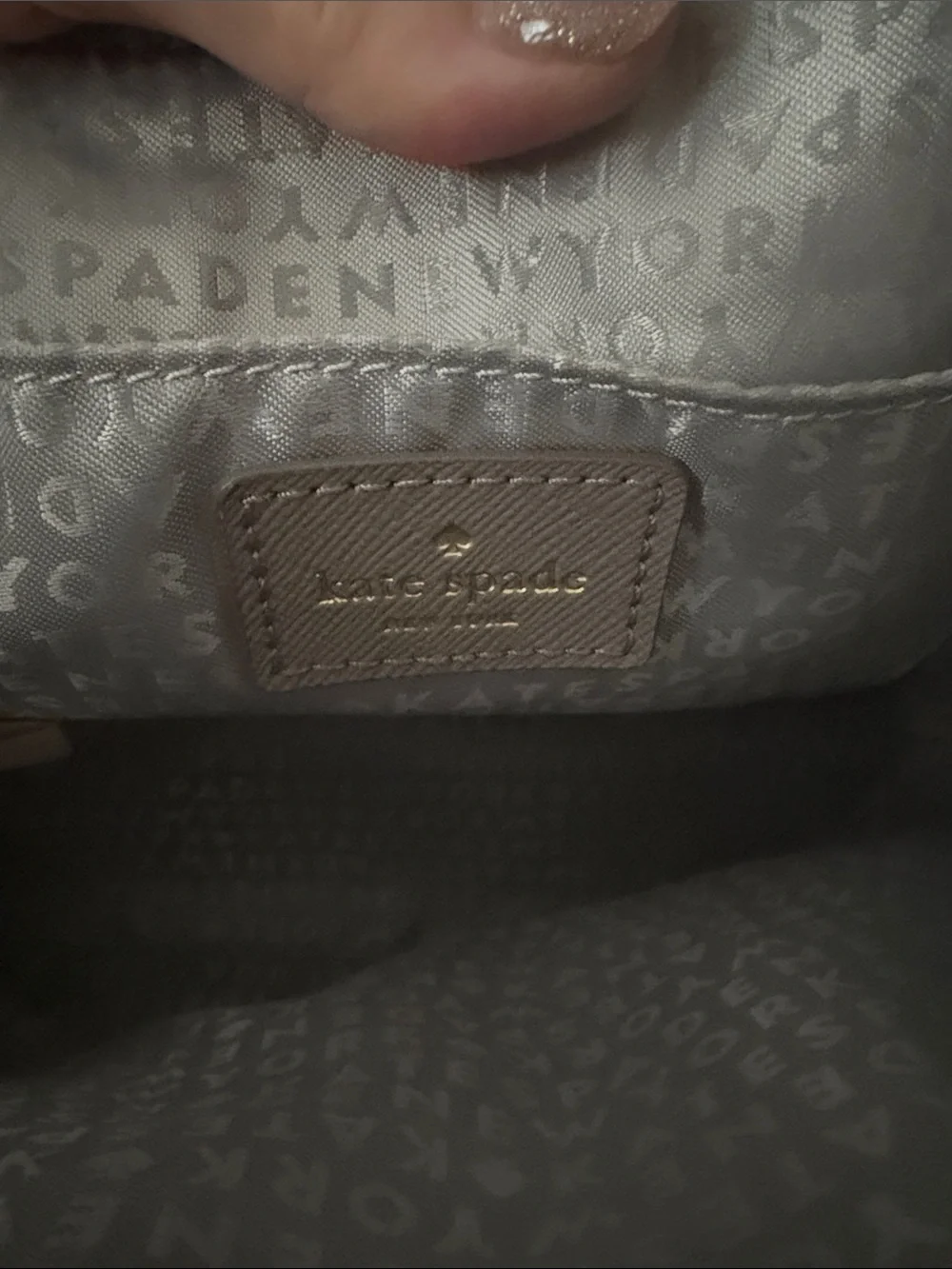 kate spade mauve tote with glitter bottom and gold logo